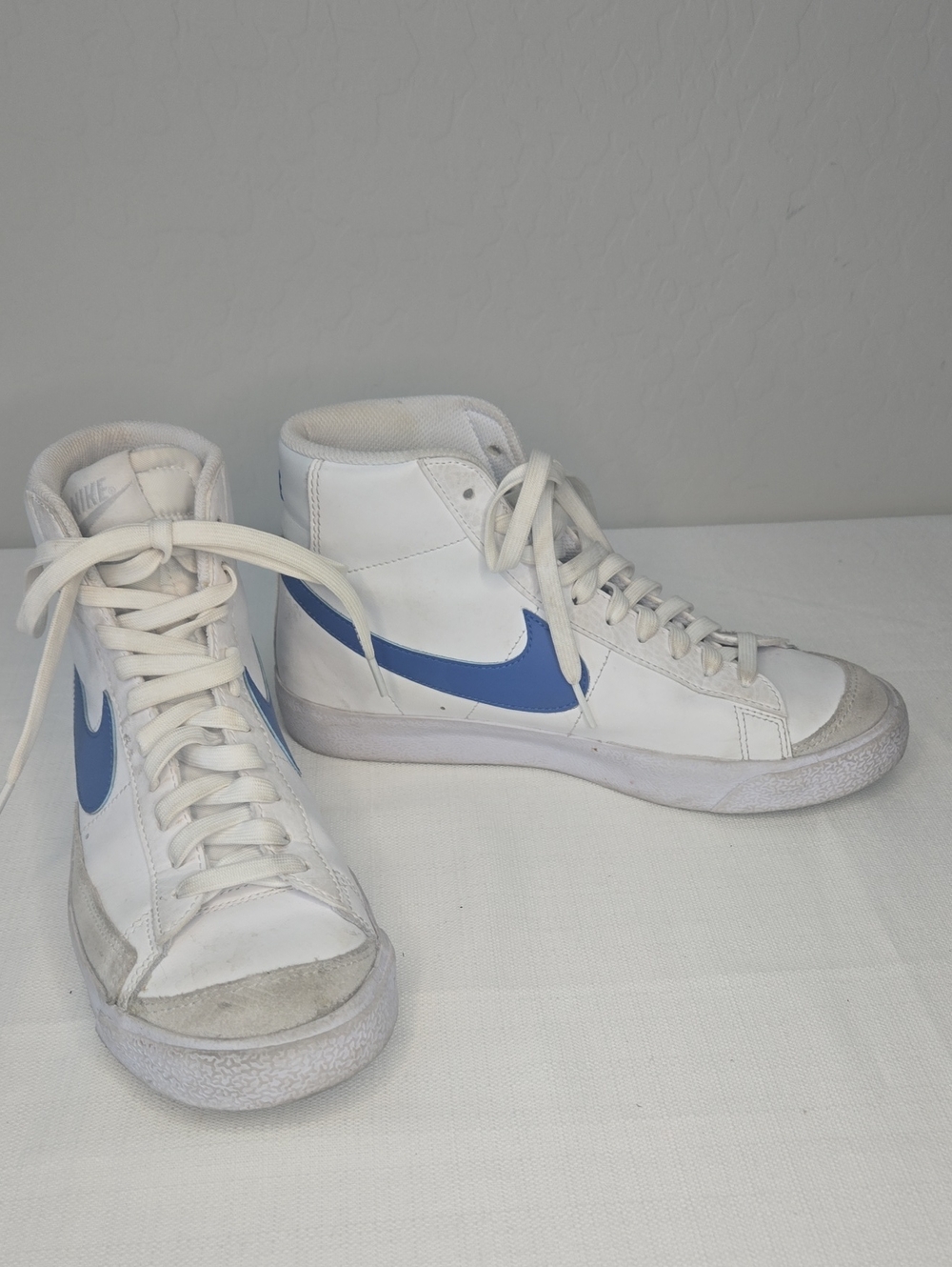 Nike Blazer White High-Top Sneakers with Blue Swoosh
